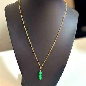 Elegant Gold Necklace with Jade Green Pendant